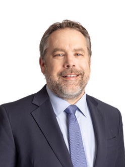 Professional portrait of Chris Kopecky, against a clean background.